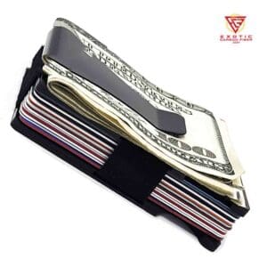 Carbon fiber wallet with cash and cards.