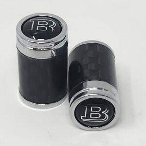 Aston Martin Black Logo on White Carbon Fiber Tire Valve Caps- Perfect